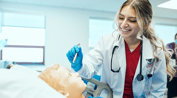 LRU nursing student at bedside